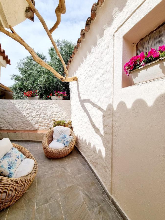 Stazzo San Teodoro Il Ginepro Piscina Condivisaアパートメント エクステリア 写真