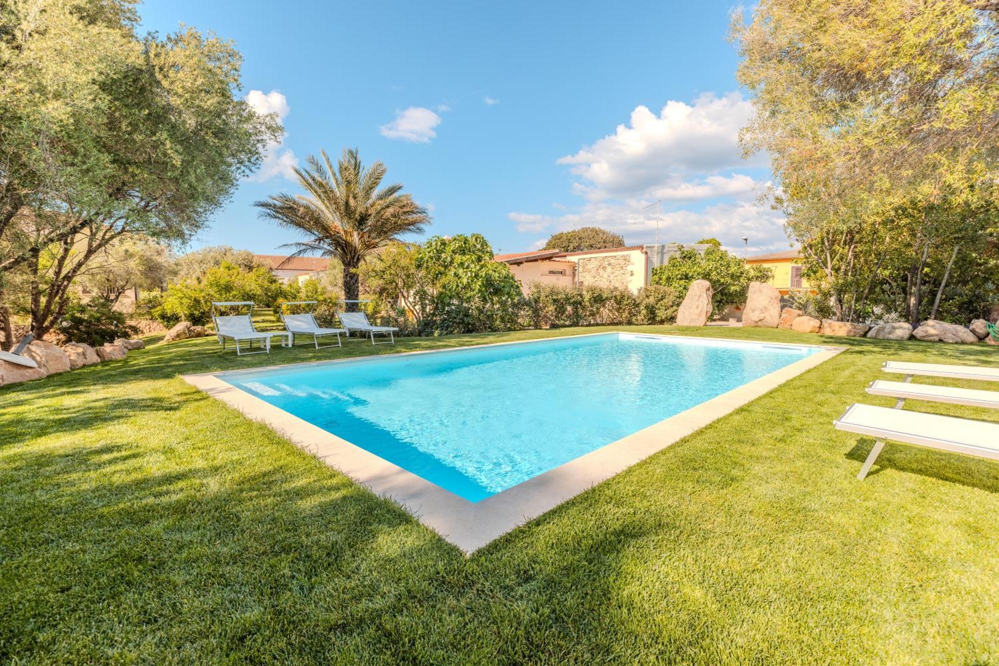 Stazzo San Teodoro Il Ginepro Piscina Condivisaアパートメント エクステリア 写真
