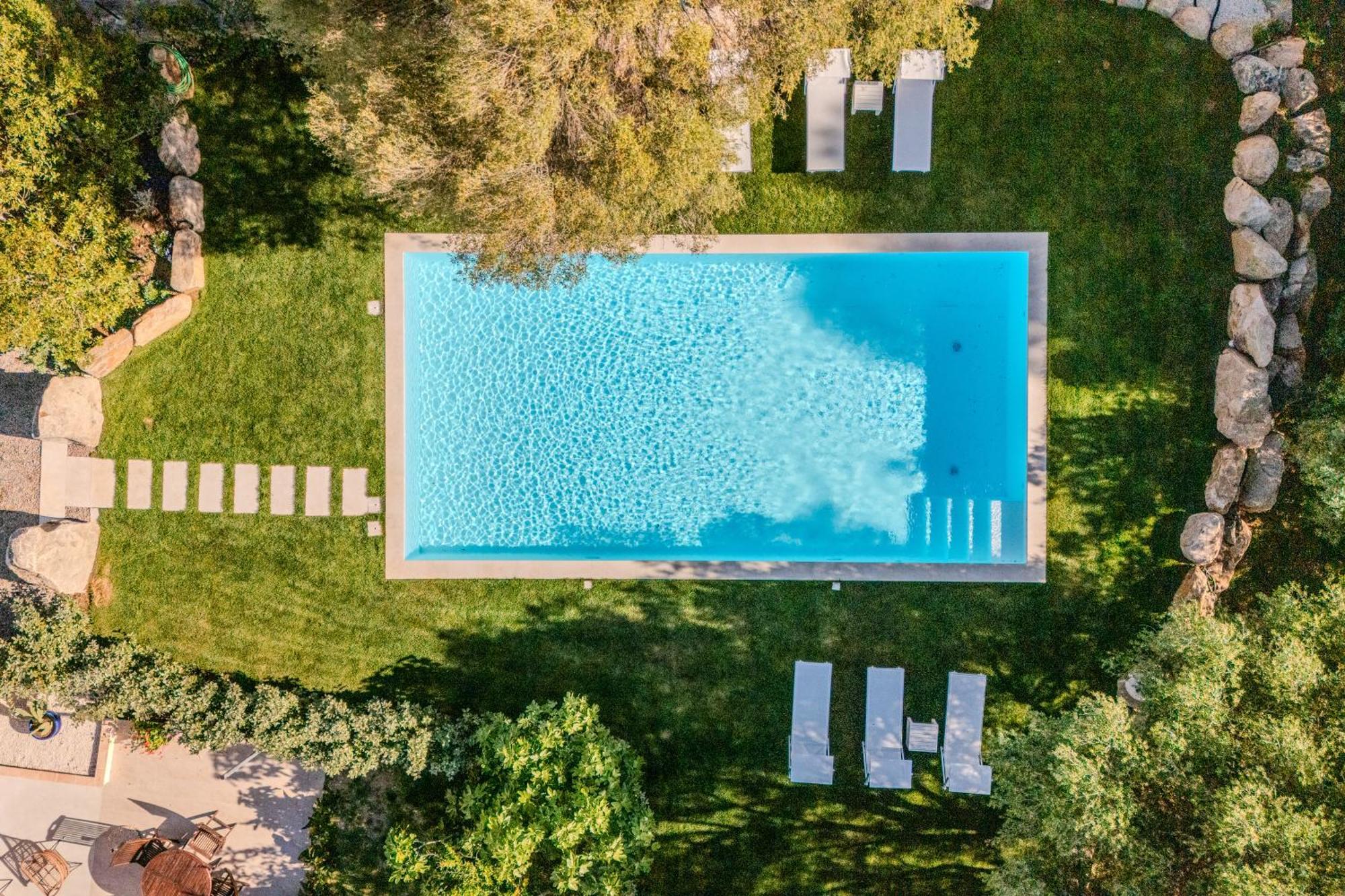 Stazzo San Teodoro Il Ginepro Piscina Condivisaアパートメント エクステリア 写真